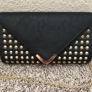 Black and gold cross body clutch